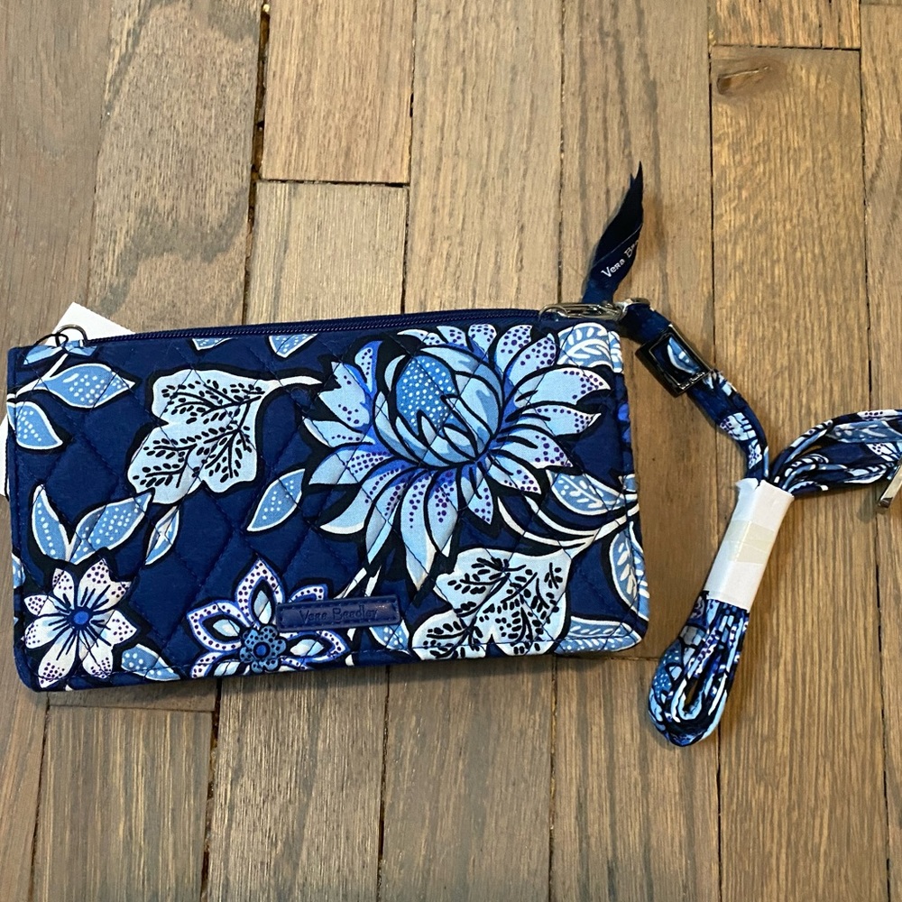 Blue Vera Bradley wallet with RFID protection and zip pocket.